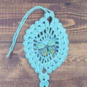 Kaleidoscope Butterfly on Pastel Teal Flutter Charm