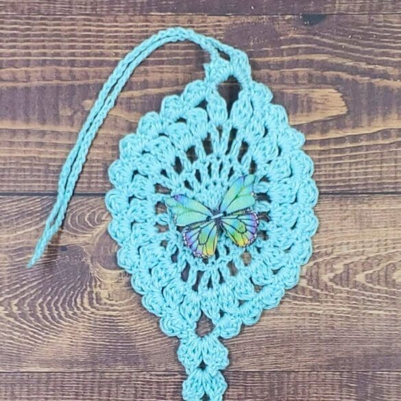 Kaleidoscope Butterfly on Pastel Teal Flutter Charm
